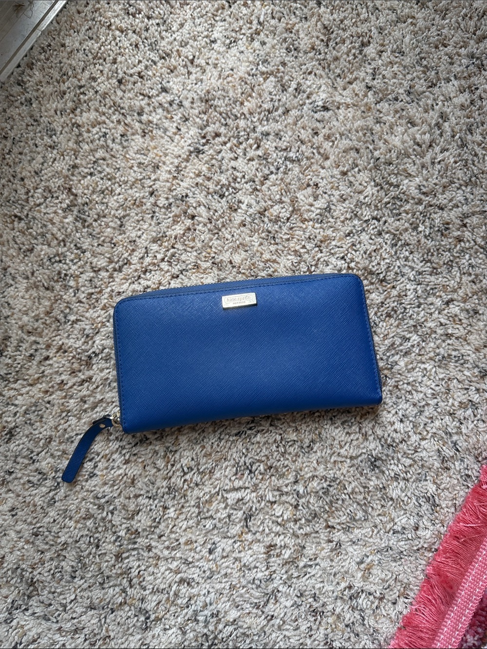 kate spade royal blue zip-around continental wallet with gold hardware